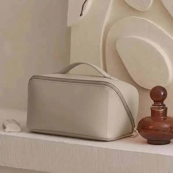 Same makeup bag after AI Photo Recolor — new shell color, zipper and stitching preserved
